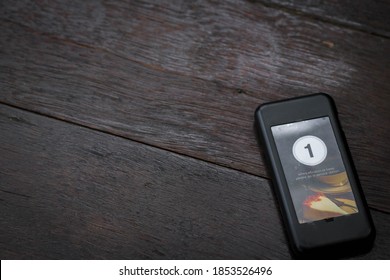 Wireless Queue Calling On Wooden Table At Coffee Shop. Queue Paging Wireless Calling System In A Restaurant. Copy Space.