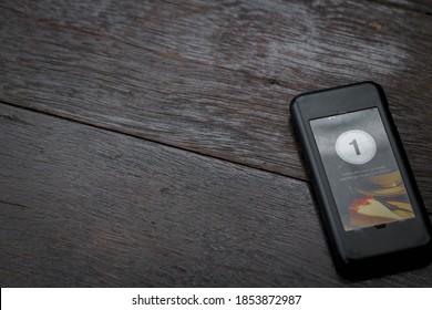 Wireless Queue Calling On Wooden Table At Coffee Shop. Queue Paging Wireless Calling System In A Restaurant. Copy Space.