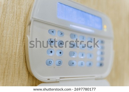 wireless security keypad installation, textured wallmounted security panel with bright indicator