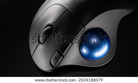 Wireless Trackball Computer mouse on a black background