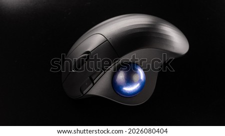 Wireless Trackball Computer mouse on a black background