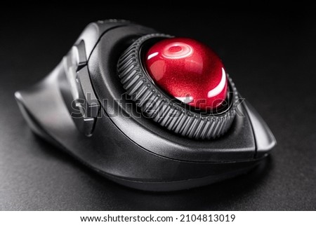 Wireless Trackball Computer mouse on a black background