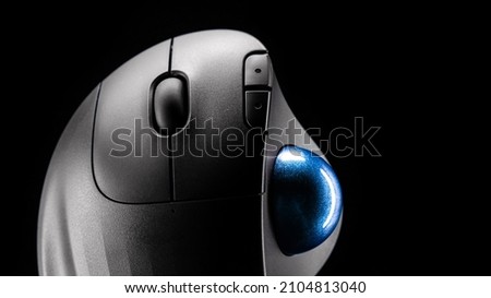 Wireless Trackball Computer mouse on a black background