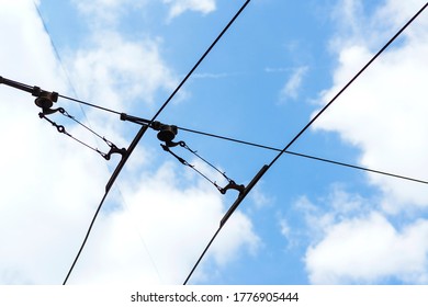 Wires for the trolley against the sky backgound. Copy space.