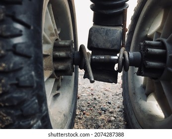 Wire-secured Wheels Of An Old Baby Carriage