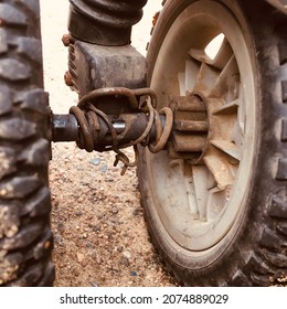 Wire-secured Wheels Of An Old Baby Carriage