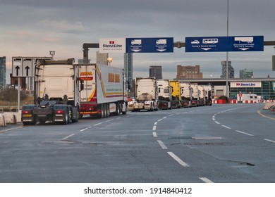 Wirral, UK - Feb 6 2021: Lorry tractor units queuing at the Stena Line roll on - roll off Liverpool to Belfast ferry Terminal in Birkenhead on the River Mersey.