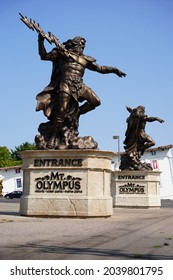 Wisconsin Dells, Wisconsin USA - September 10th, 2021: Statues Of The Greek Demi-God Zeus Sit In Front Of Mt. Olympus Water Park.