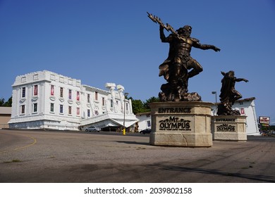 Wisconsin Dells, Wisconsin USA - September 10th, 2021: Statues Of The Greek Demi-God Zeus Sit In Front Of Mt. Olympus Water Park.