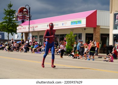 Wisconsin Dells, Wisconsin USA - September 18th, 2022: Man In Spider Man Costume Interacted With Spectators At A Fall Festival Parade. 