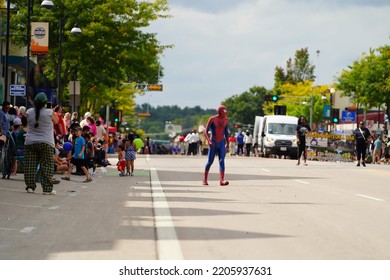 Wisconsin Dells, Wisconsin USA - September 18th, 2022: Man In Spider Man Costume Interacted With Spectators At A Fall Festival Parade. 