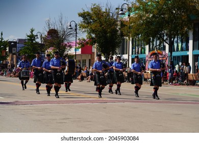 Wisconsin Dells, Wisconsin USA - September 19th, 2021: Group Of Bag Pipe And Drum Players From Madison Pipes And Drums Marched In Wa Zha Wa Fall Festival Parade.