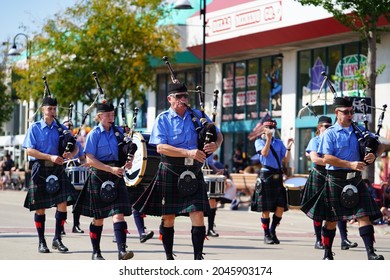 Wisconsin Dells, Wisconsin USA - September 19th, 2021: Group Of Bag Pipe And Drum Players From Madison Pipes And Drums Marched In Wa Zha Wa Fall Festival Parade.