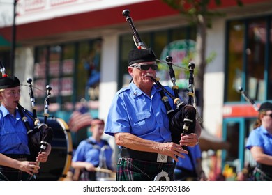 Wisconsin Dells, Wisconsin USA - September 19th, 2021: Group Of Bag Pipe And Drum Players From Madison Pipes And Drums Marched In Wa Zha Wa Fall Festival Parade.