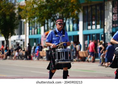 Wisconsin Dells, Wisconsin USA - September 19th, 2021: Group Of Bag Pipe And Drum Players From Madison Pipes And Drums Marched In Wa Zha Wa Fall Festival Parade.