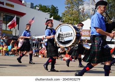 Wisconsin Dells, Wisconsin USA - September 19th, 2021: Group Of Bag Pipe And Drum Players From Madison Pipes And Drums Marched In Wa Zha Wa Fall Festival Parade.