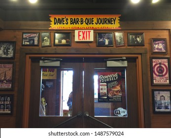 Wisconsin, USA; June 30, 2019: The Main Door Of The Famous Dave’s Restaurant In The Wisconsin Dells, Surrounded With Framed American Memorabilia.