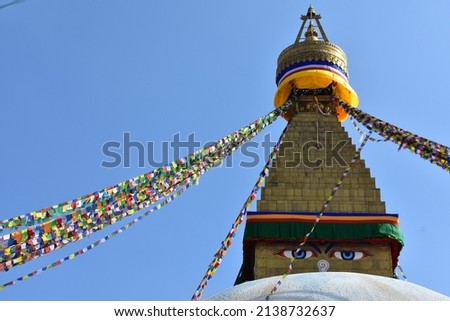 wisdom eyes at  Bouddhanath  stupa and colourful prayer flags with blue sky at Katmandu nepal Foto stock © 