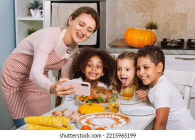 I Wish You A Happy Thanksgiving. Autumn Holiday. The Family Sits Down At The Table, Take Selfies And Celebrate The Holiday. Traditional Dinner.