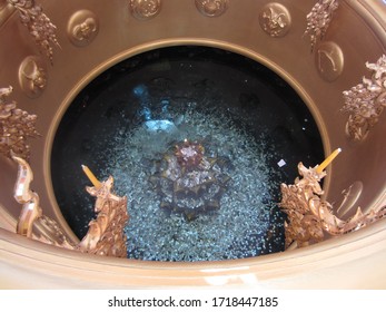 Wishing Well With Coins In Thailand