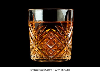 Wiskey Beverage In Glass Isolated On Black Background