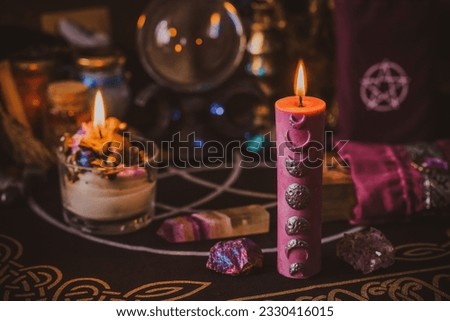Witch altar, powerful magic stuff, candles, pagan or wiccan concept
