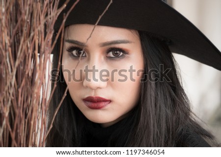 The witch and broomstick on dark background, Halloween day concept