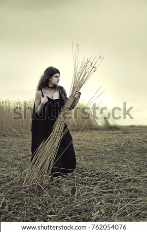 Similar – Image, Stock Photo beautiful and mysterious girl with scythe