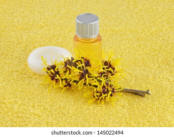 Witch Hazel Products On Yellow Towel