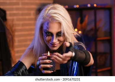 Witch performing black magic ritual - Shutterstock ID 2091670231