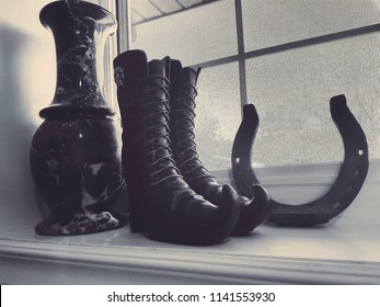 Witch Shoes And Horseshoe In Window Halloween