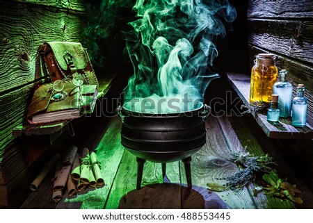 Witcher cauldron with blue and green smoke for Halloween