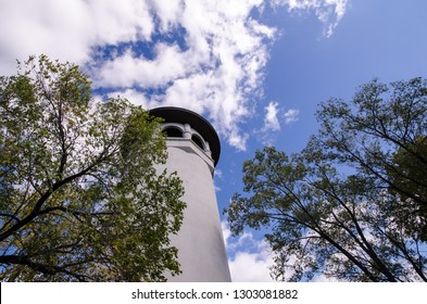 Witches Hat Water Tower in Prospect Park, Minneapolis Minnesota, on a partly cloudy day - Shutterstock ID 1303081882
