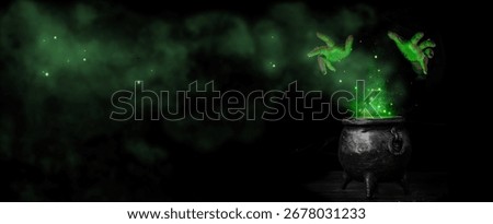 Witch's hands over a cauldron with a magic potion in a dark room. Witch witchcrafting, casting spells on Halloween night