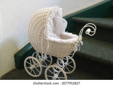          Withe Vintage Doll Pram On Stairs                      