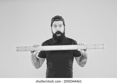 Without geometry life is pointless. Surprised hipster hold ruler yellow background. Geometry lesson. Bearded man use geometrical tool for geometry. Teaching geometry in school - Shutterstock ID 2050344461