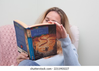 Witney, Oxfordshire, UK, 03 04 2022 A Woman Reading The Book The Hobbit By J R R Tolkien