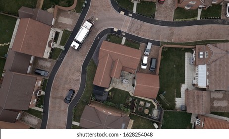 WITNEY, UK. OCTOBER 18 2017. Oxfordshire Housing Estate Aerial With Dustbin Lorry.