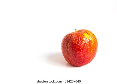 Wizen apple presented as old aging skin