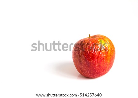 Wizen apple presented as old aging skin