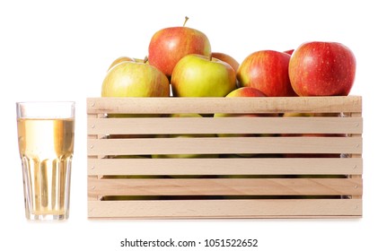 A wodden box of apples a glass of apple juice on a white background Isolation