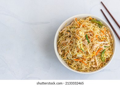 Wok Tossed Chicken Noodles With Chopsticks Top Down Asian Food Photo