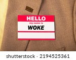 WOKE name tag on jacket. My name is WOKE.