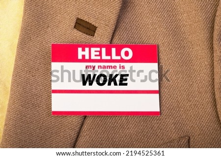 WOKE name tag on jacket. My name is WOKE.