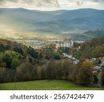 Wolfsberg in Austria on Alpine landscape background