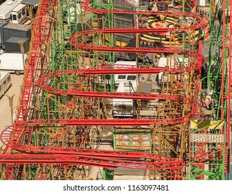 Wolfsburg, Lower Saxony, May 5, 2018: Aerial View Of A Roller Coaster On The Funfair Called 