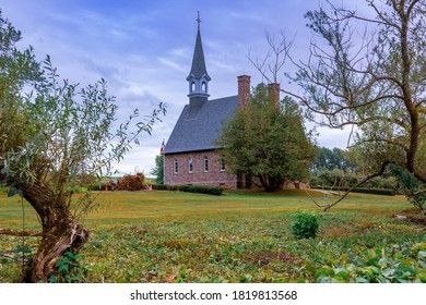 Wolfville, Nova Scotia, Canada - August 21, 2020 : Historic Church At Grand-Pré National Historic Site, Wolfville,  Annapolis Valley, Nova Scotia, Canada. 
