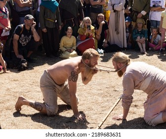 WOLIN, POLAND - AUGUST 6, 2022: XXVII Festival Of Slavs And Vikings, Two Viking Reenactors Wrestling