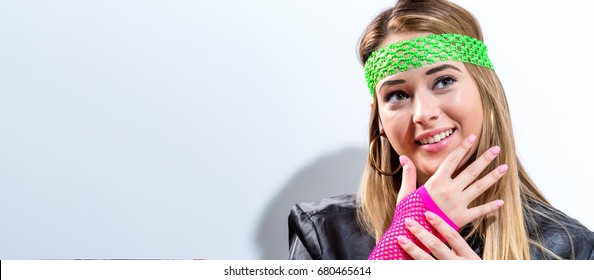 Woman In 1980's Fashion On A White Background