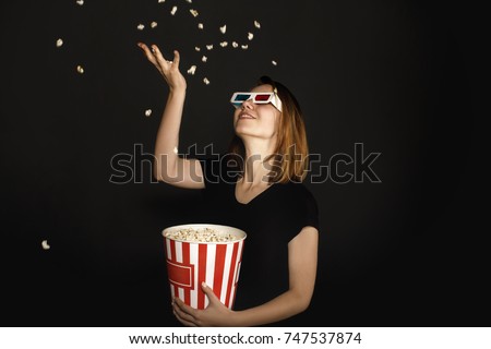 Similar – Image, Stock Photo Cheerful young woman watching a movie